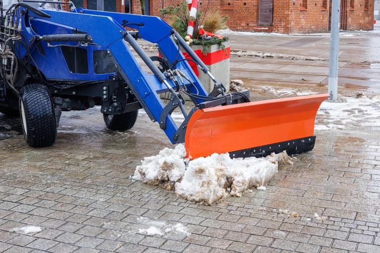 Tractor clearing snow